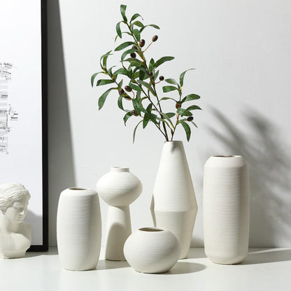 White three-piece ceramic decorative vase set