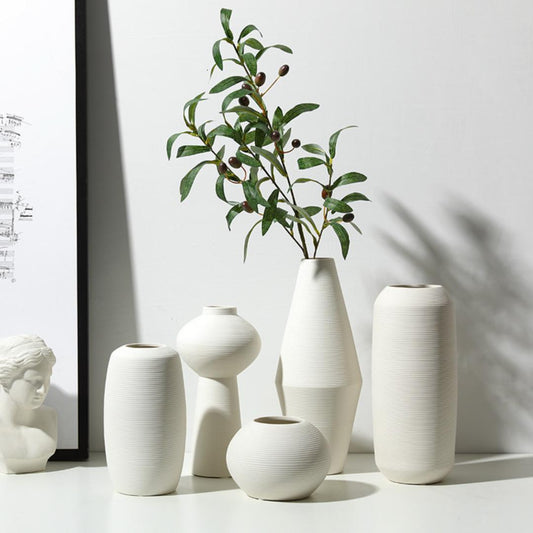 White three-piece ceramic decorative vase set