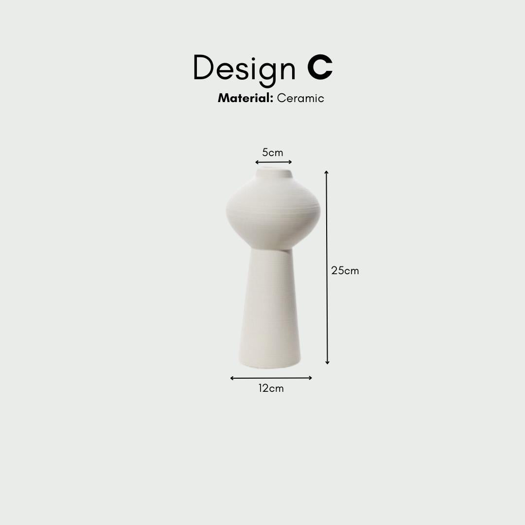 White three-piece ceramic decorative vase set
