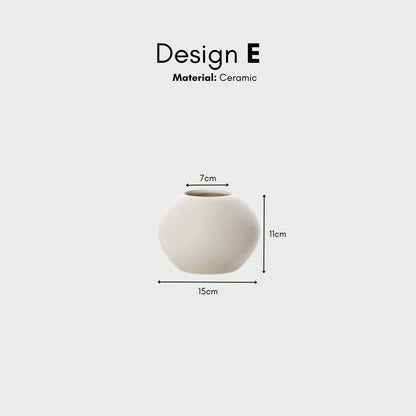 White three-piece ceramic decorative vase set